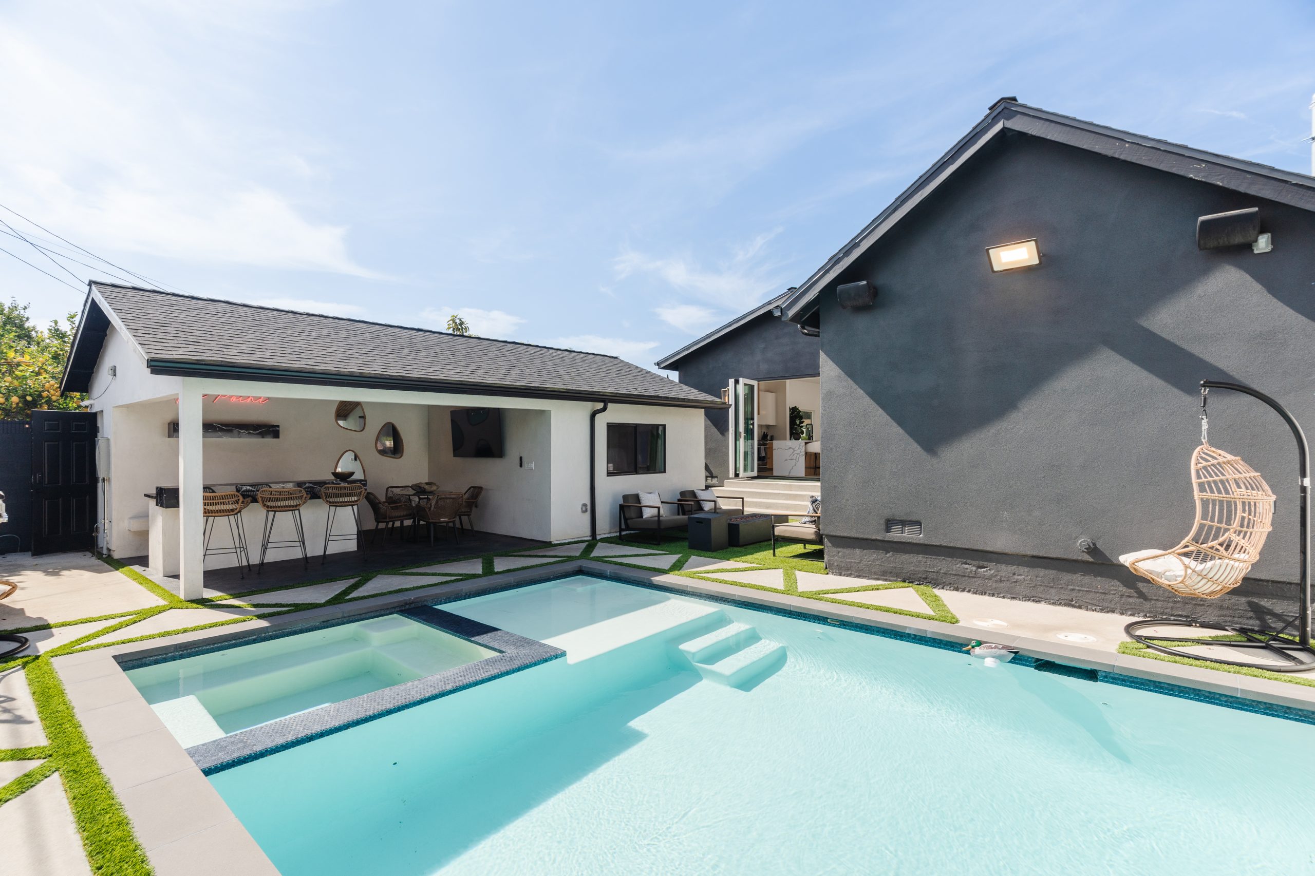 Pool with outdoor bar and lounge