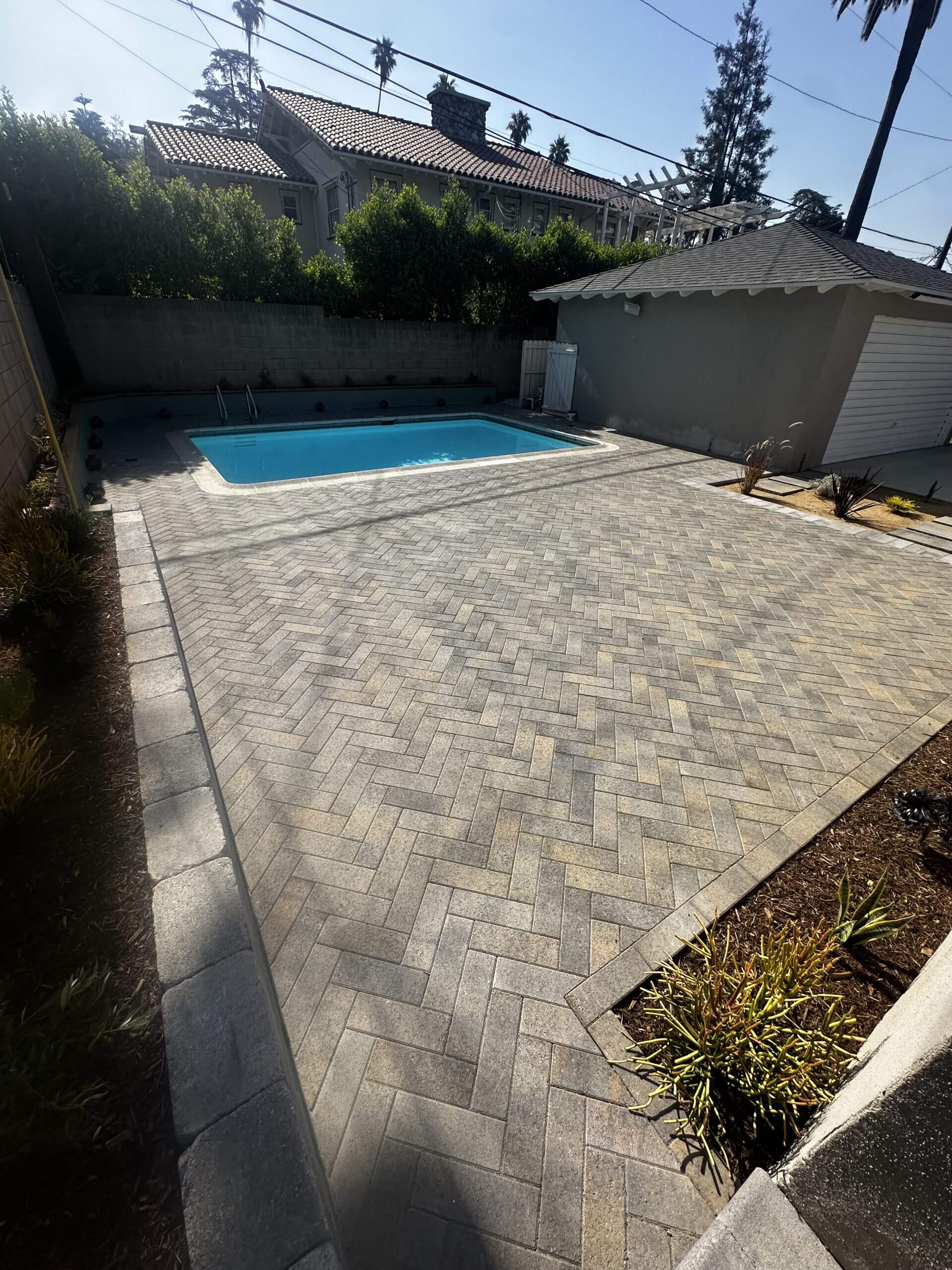 Herringbone paver pool deck