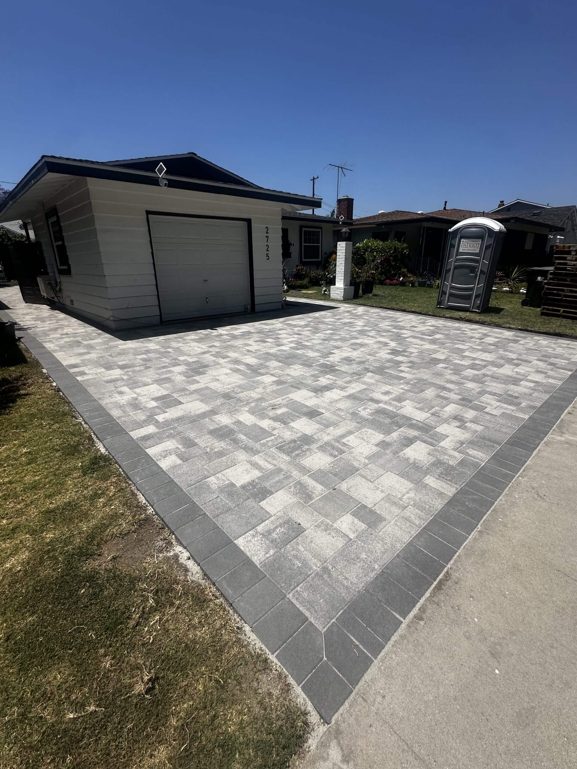 Paver driveway with contrasting border banding