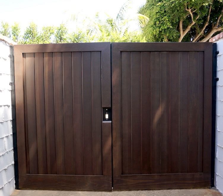 Dark espresso wood double gate with clean modern panels