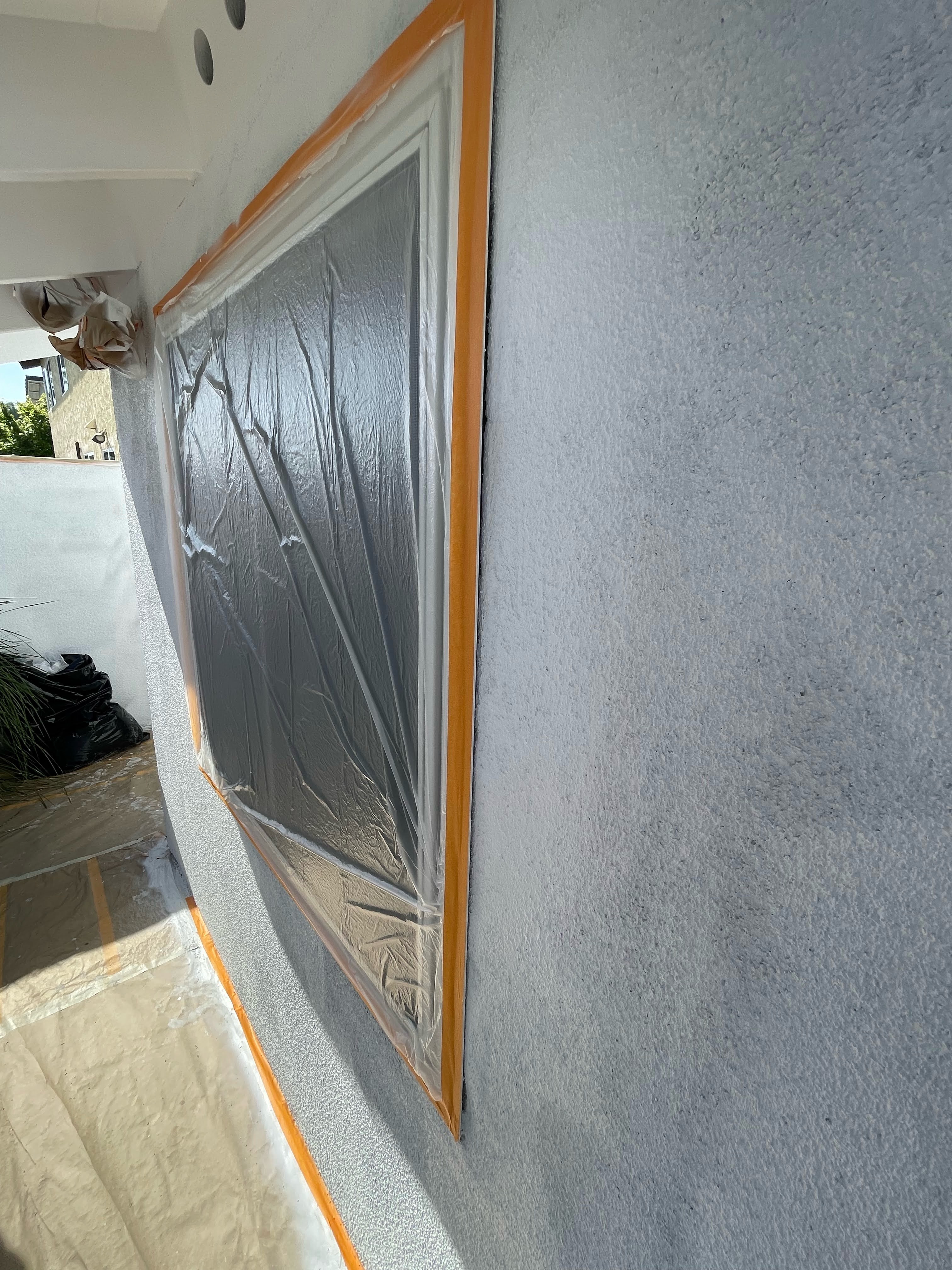 Detail of clean masking and finished stucco
