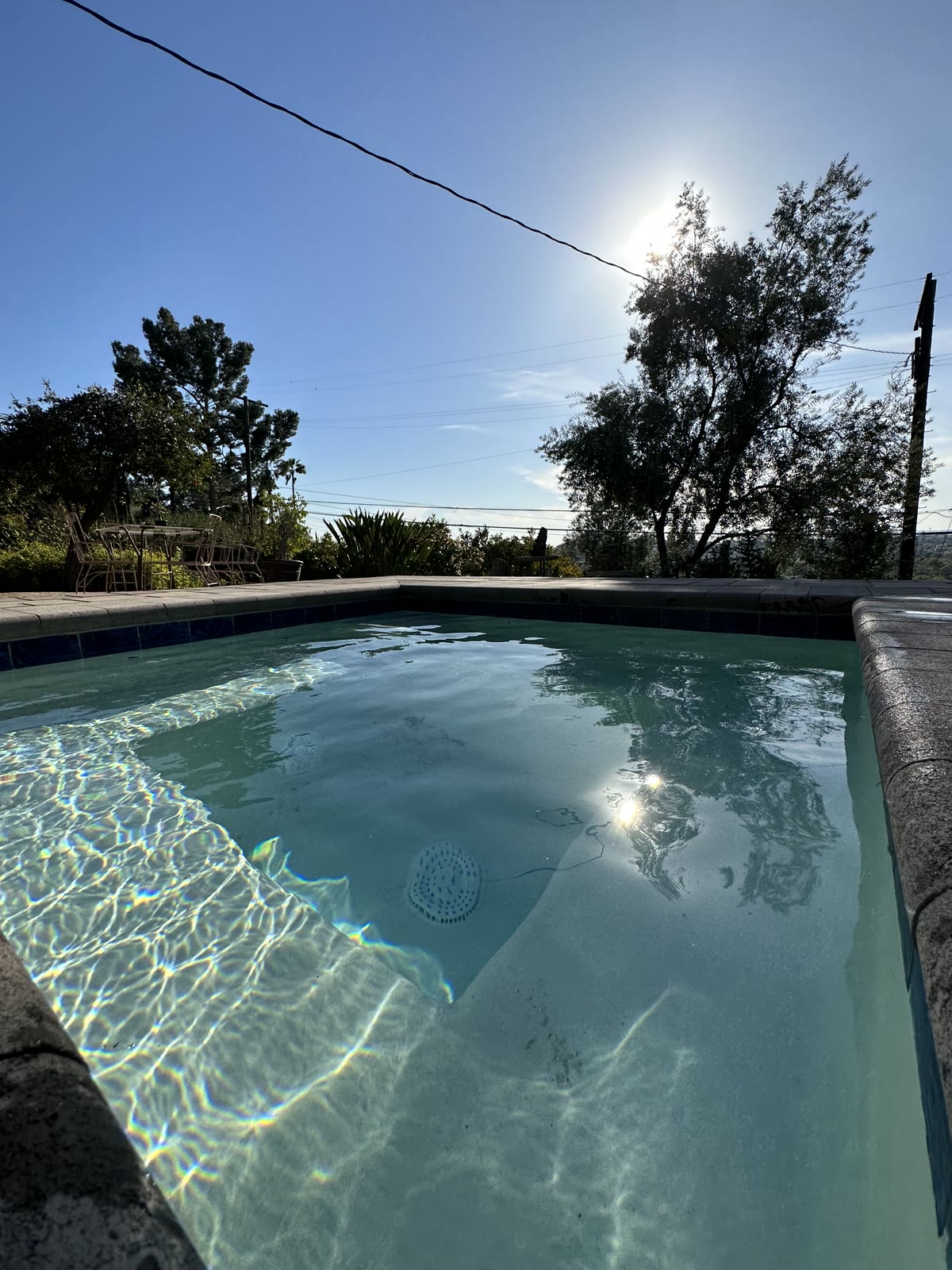 Spa water with hillside view at golden hour